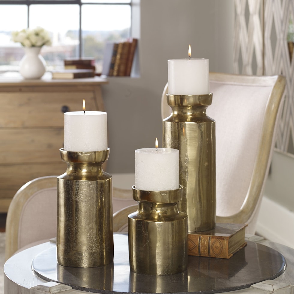 amina gold candleholders   