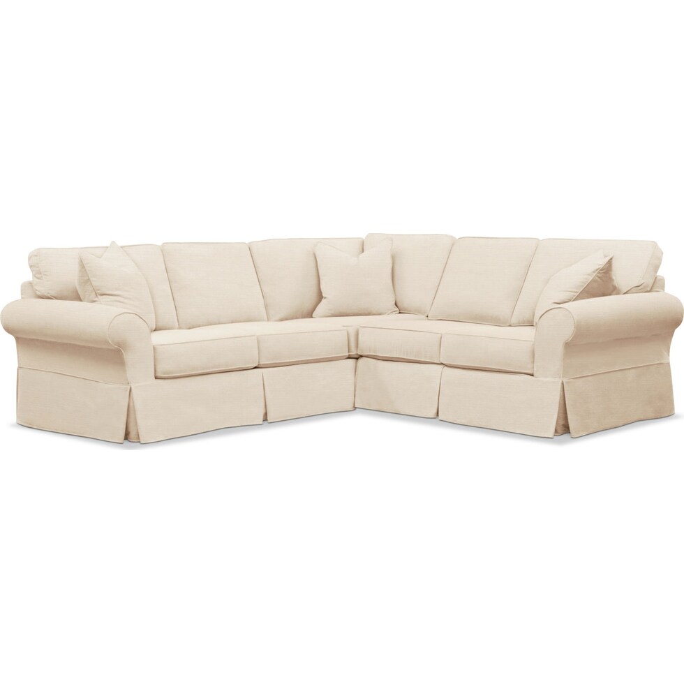 beige  pc slipcover sectional with right facing loveseat   