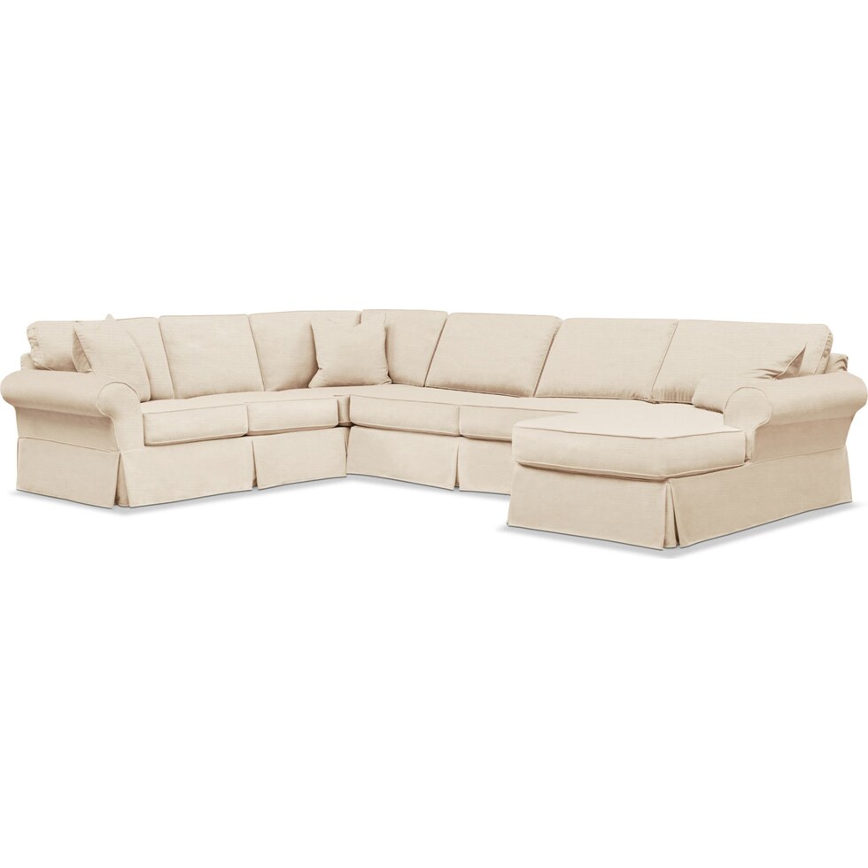 beige  pc slipcover sectional with right facing chaise   