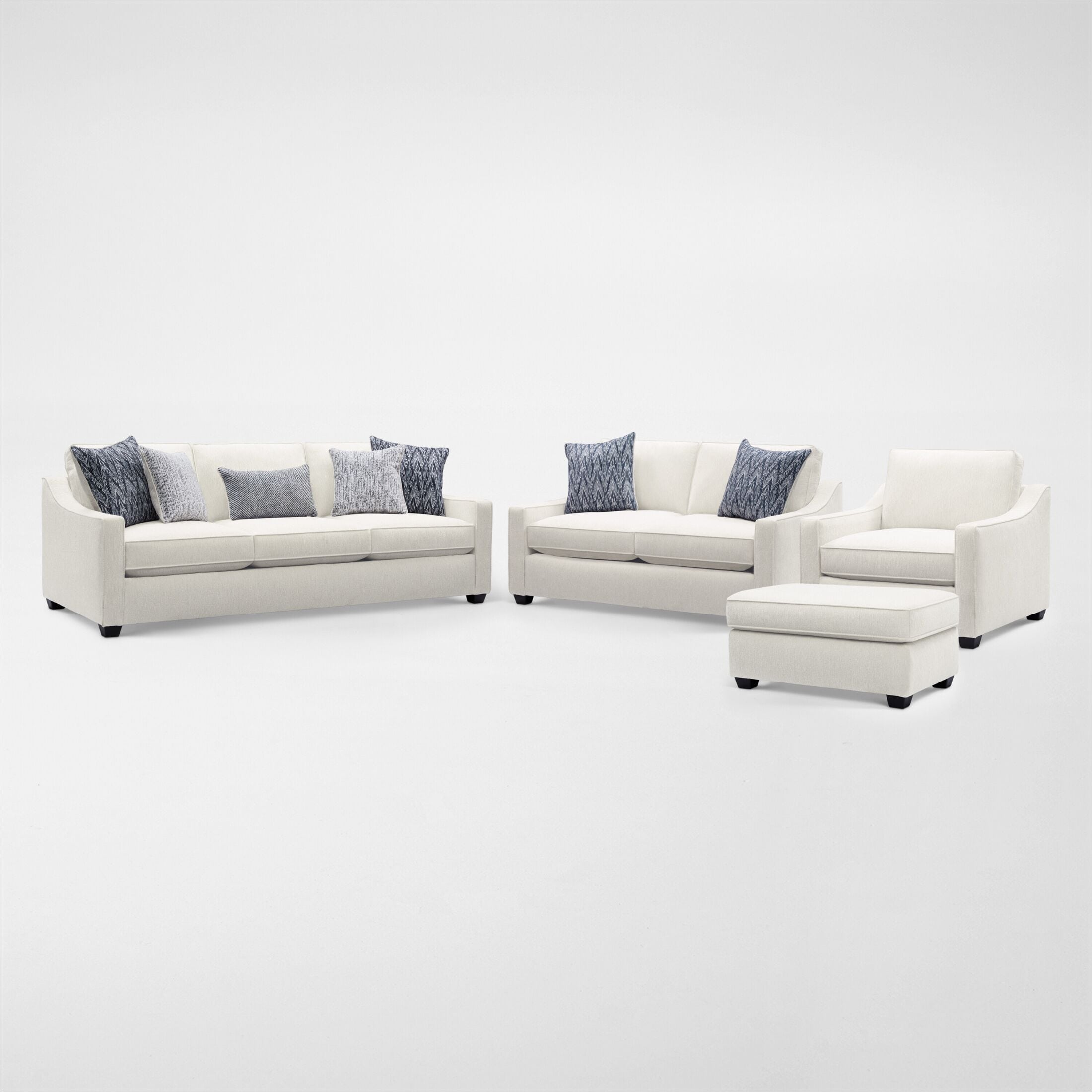 white loveseat with ottoman