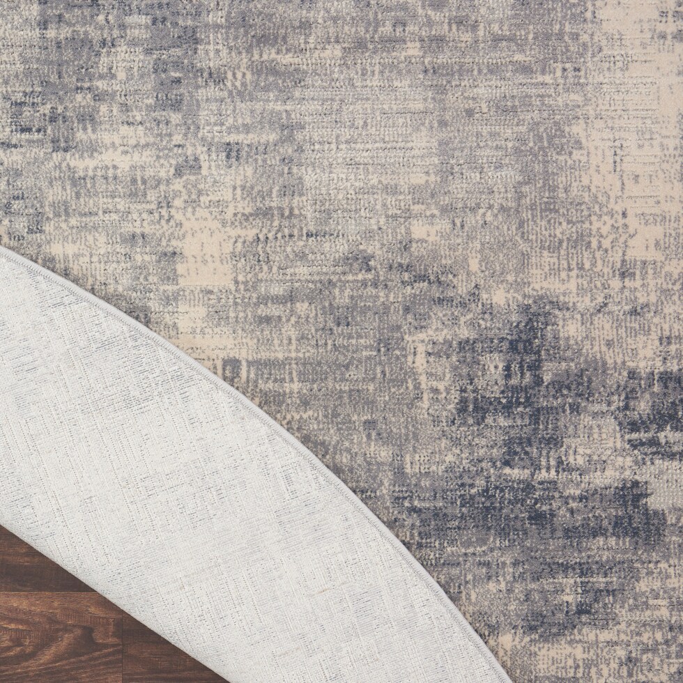 jamesport blue area rug  round   