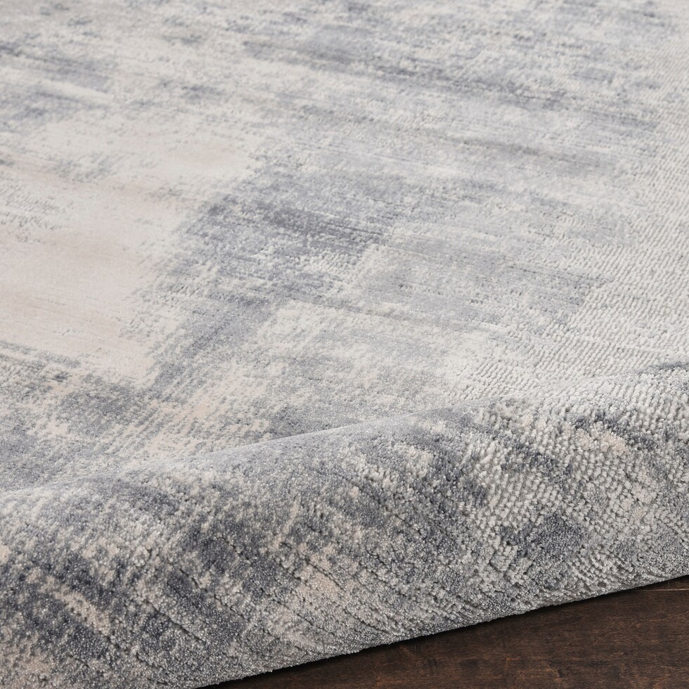 jamesport blue area rug  round   
