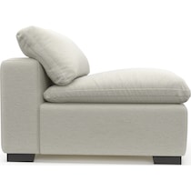 plush white armless chair   