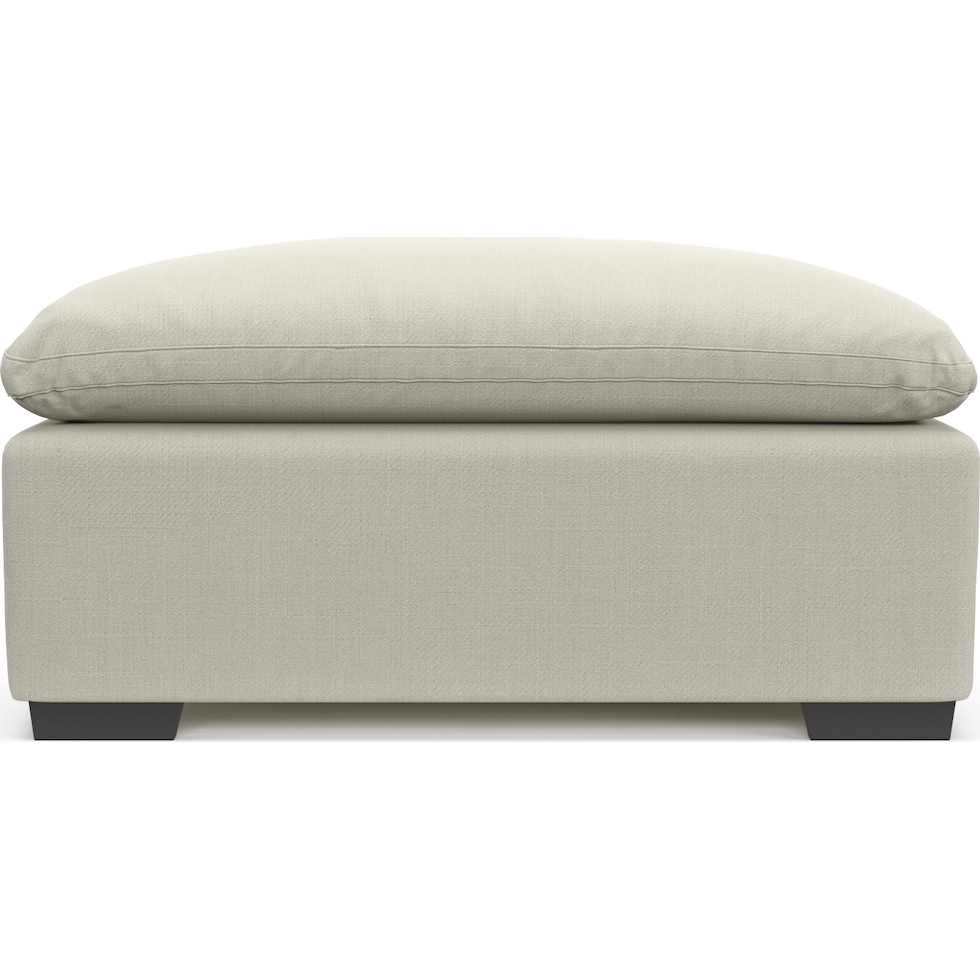 plush white ottoman   