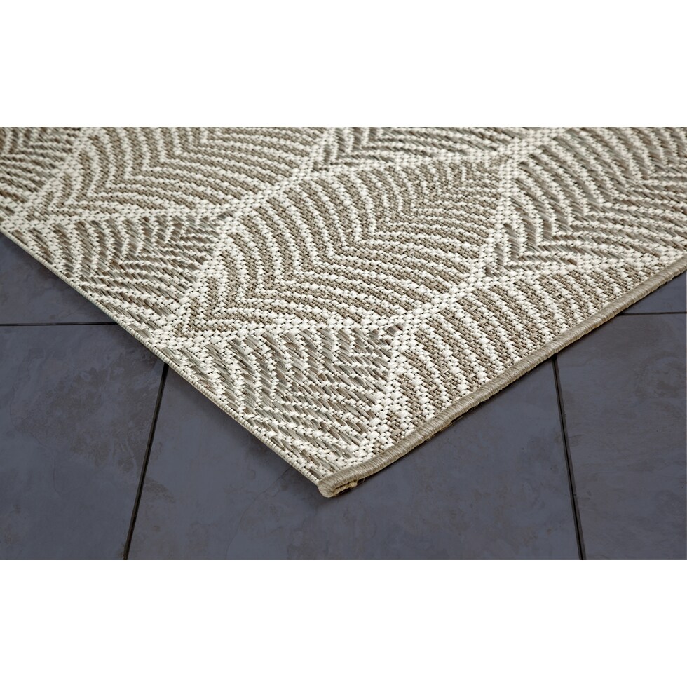 tan and brown rug   
